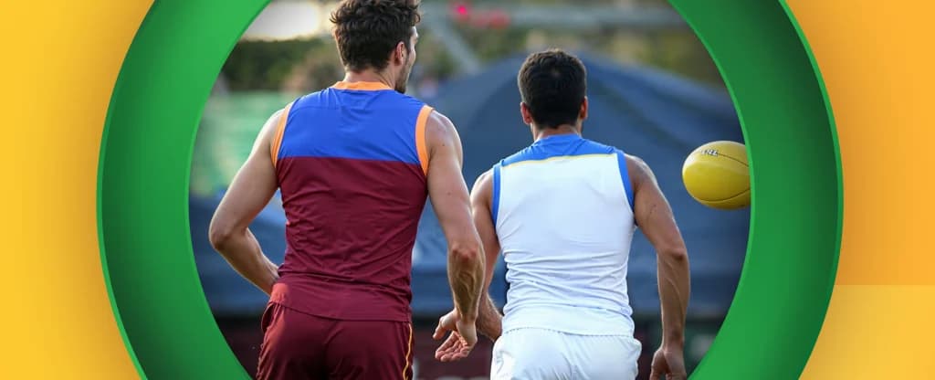 Brisbane Lions and Gold Coast Suns players contesting the ball during AFL QClash 11 in 2016.