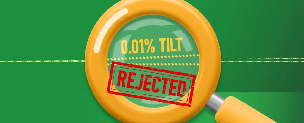 On a green background, a yellow magnifying glass shows us 0.01% tilt and a red ‘REJECTED’ stamp