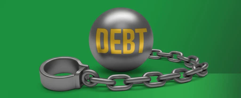 A ball and chain is shown over a green background, and the word ‘debt’ is stamped on the ball, demonstrating that debt from problem gambling poses the biggest risk to players. 
