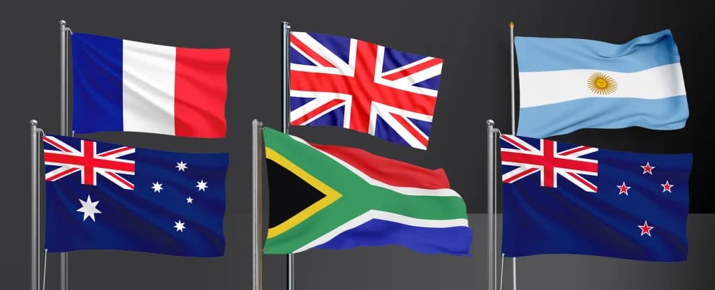 A row of six national flags waving on flagpoles against a dark background. The flags shown are France, the United Kingdom, Argentina, Australia, South Africa, and New Zealand.