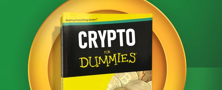 A book that reads ‘Crypto for Dummies’ is centred on a green background.