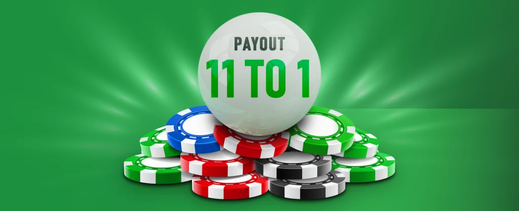 A large white casino ball displaying the text "PAYOUT 11 TO 1" siting on top of a pile of red, green, blue, and black poker chips on a glowing bright green background.
